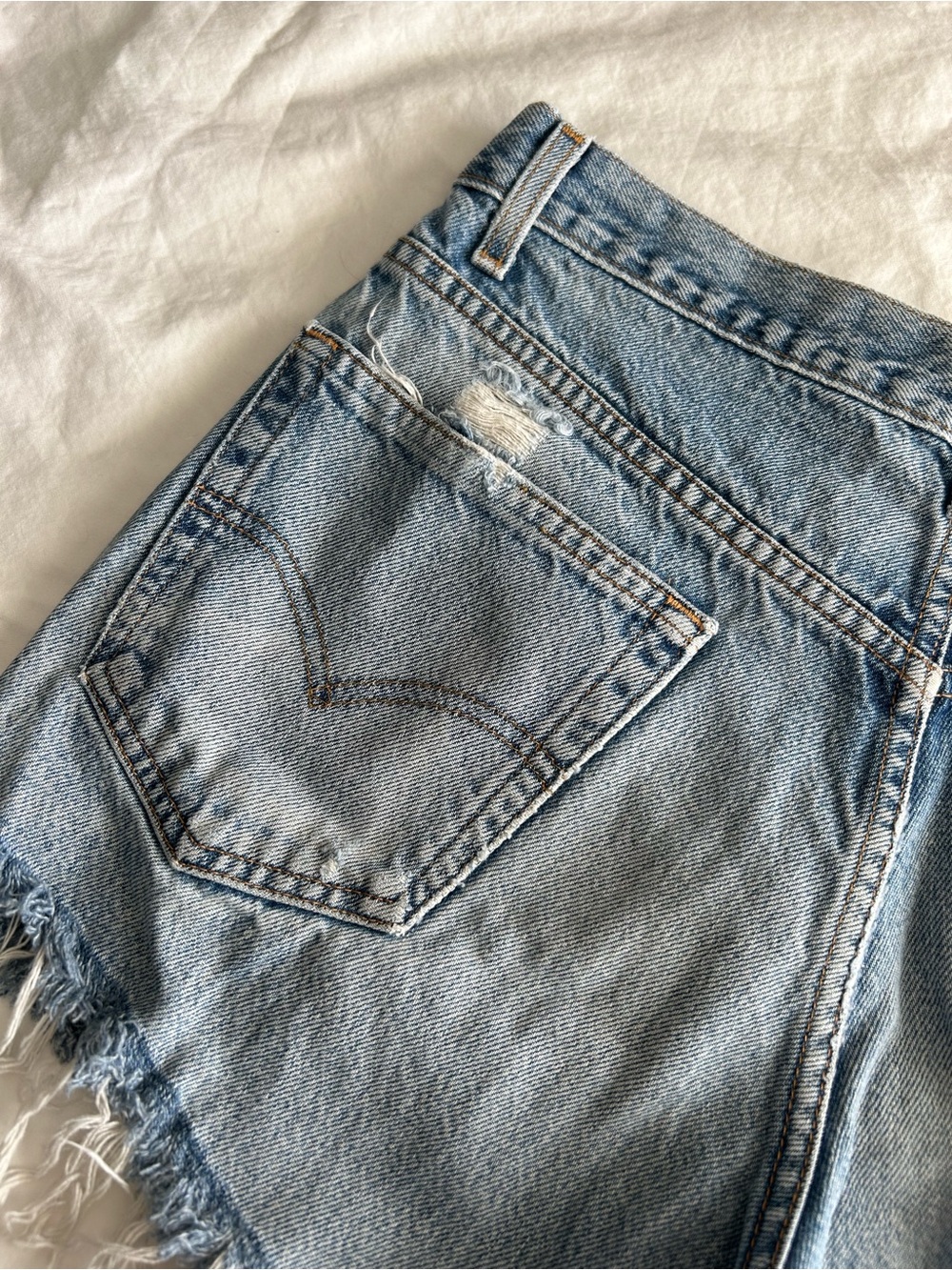 Levi's 550s Light Wash Distressed Denim Cutoff Shorts - Picture 10 of 15
